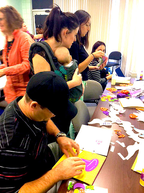 Everyone is making books at make it take it.